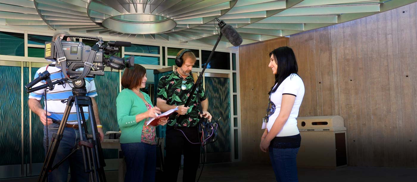 Camera crew interviews a subject at the Springs Preserve