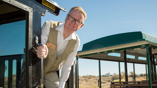 Springs Preserve volunteer on trackless train